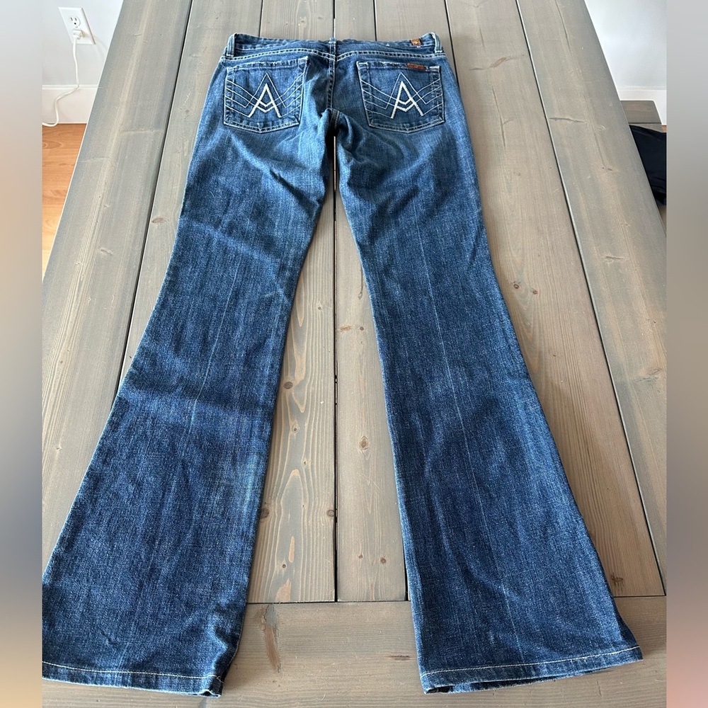7 For All Mankind Women's Dark Blue Flare Jeans with Branded Back Stitch